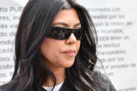 Kourtney Kardashian Strikes Feisty Pose in Silky Nightdress Amid Coachella Collab