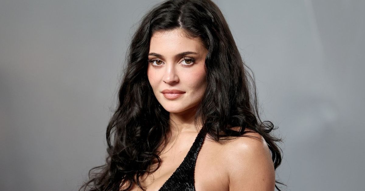 Kylie Jenner’s Sheer V-Neck Top & Low-Waist Pants Look Takes Over Instagram