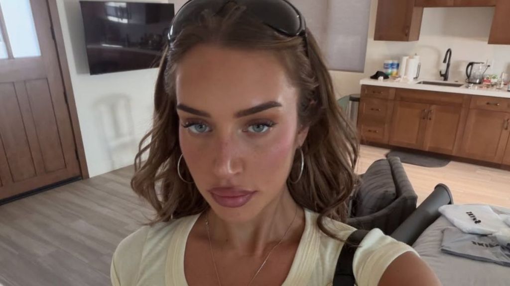 Kylie Jenner's BFF Shows off Her Curves in Fitted Tank Top & Micro Shorts