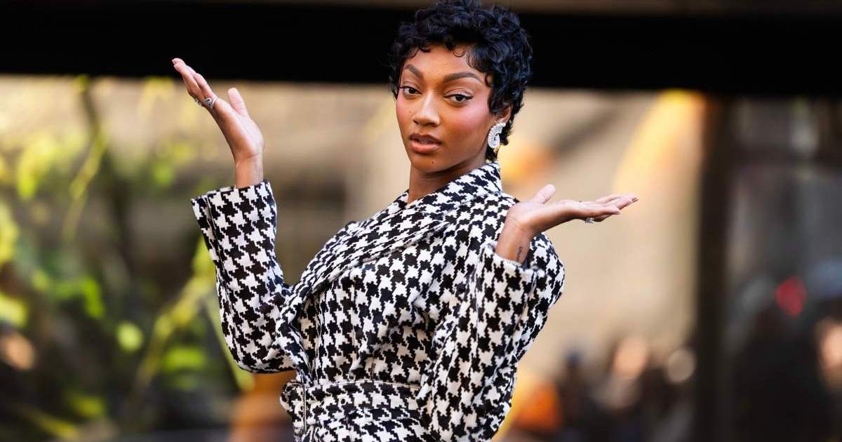 Angel Reese’s LaQuan Smith Skirt Suit Comes With a Sky-High Slit