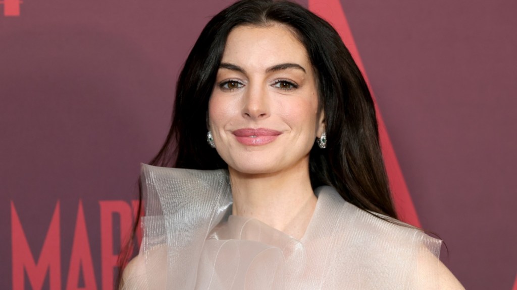 Anne Hathaway Keeps It Bold in a Bodysuit Look Ahead of Film Release