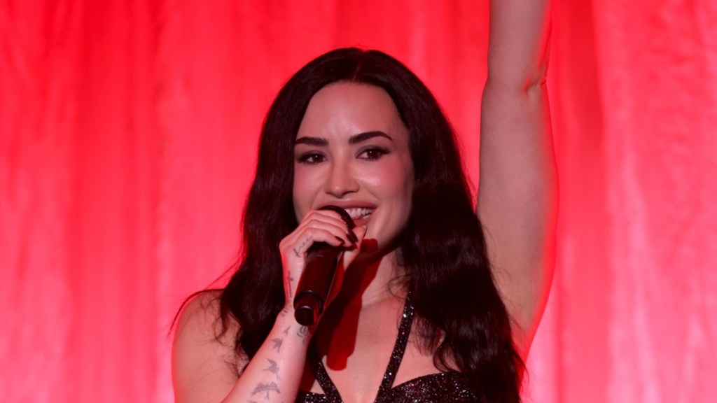 Demi Lovato’s Leg-Baring Mini Dress Comes With a Sky-High Slit