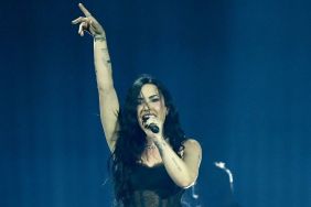 Demi Lovato Goes Boldly Sheer in Bodysuit & Fishnet Tights for Tour