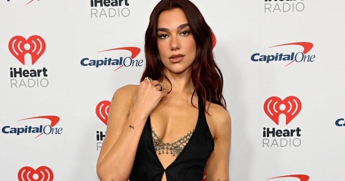 Dua Lipa Wears Just a Bra Top Under Silk Jacket