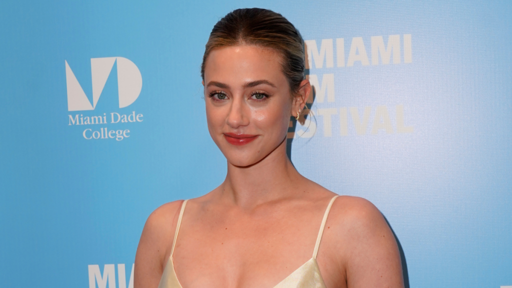 Lili Reinhart’s High Slit Blumarine Lace Dress Hangs by Just 2 Strings