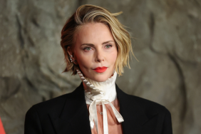 Charlize Theron Goes Topless Under Men's Jacket for Apex Premiere