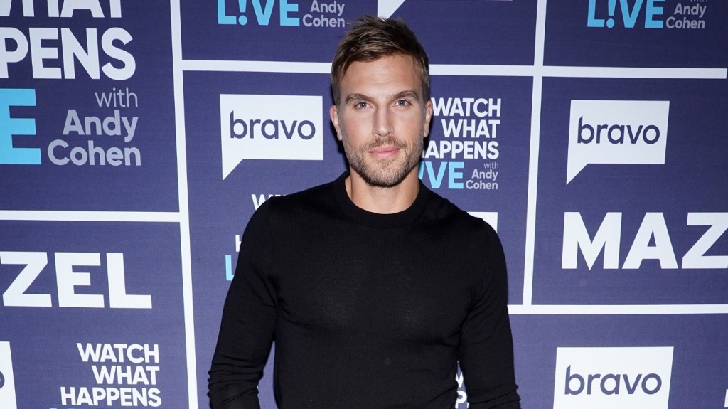 Luke Gulbranson in a black sweater backstage at Watch What Happens Live