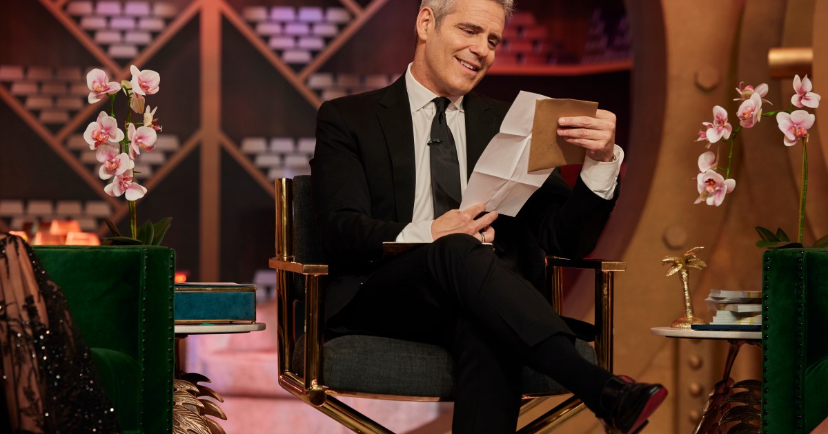 Andy Cohen reading a letter on The Real Housewives of Miami Season 5 reunion