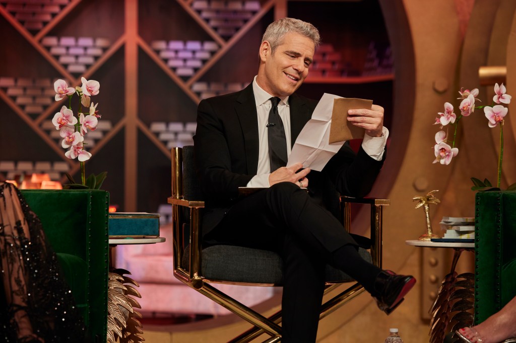 Andy Cohen reading a letter on The Real Housewives of Miami Season 5 reunion