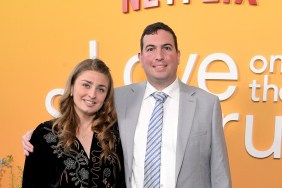 Abbey Romeo and David Isaacman pose at the Love on the Specturm premiere