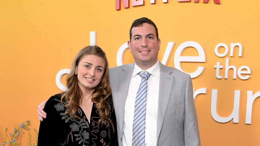 Abbey Romeo and David Isaacman pose at the Love on the Specturm premiere