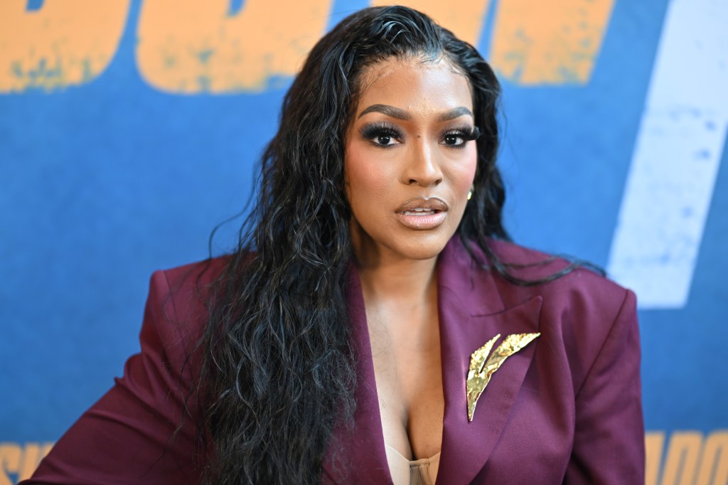 Drew Sidora in a magenta blazer attending Real Housewives of Atlanta screening of SHADOW FORCE