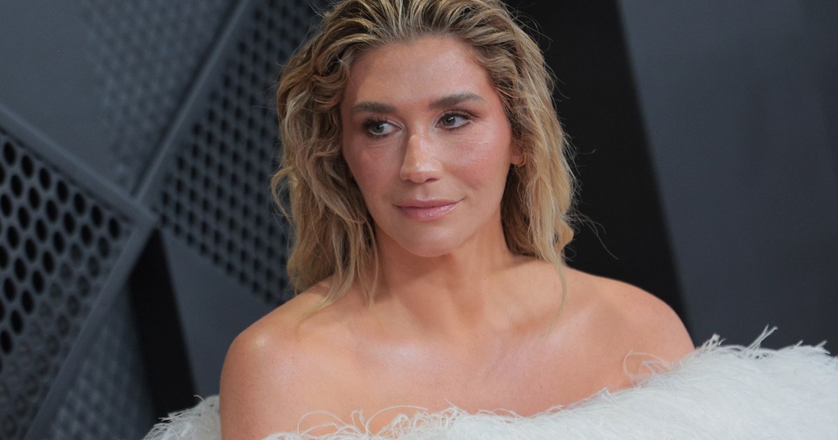 Kesha Goes Skinny Dipping To Raise Awareness in Beach Photos