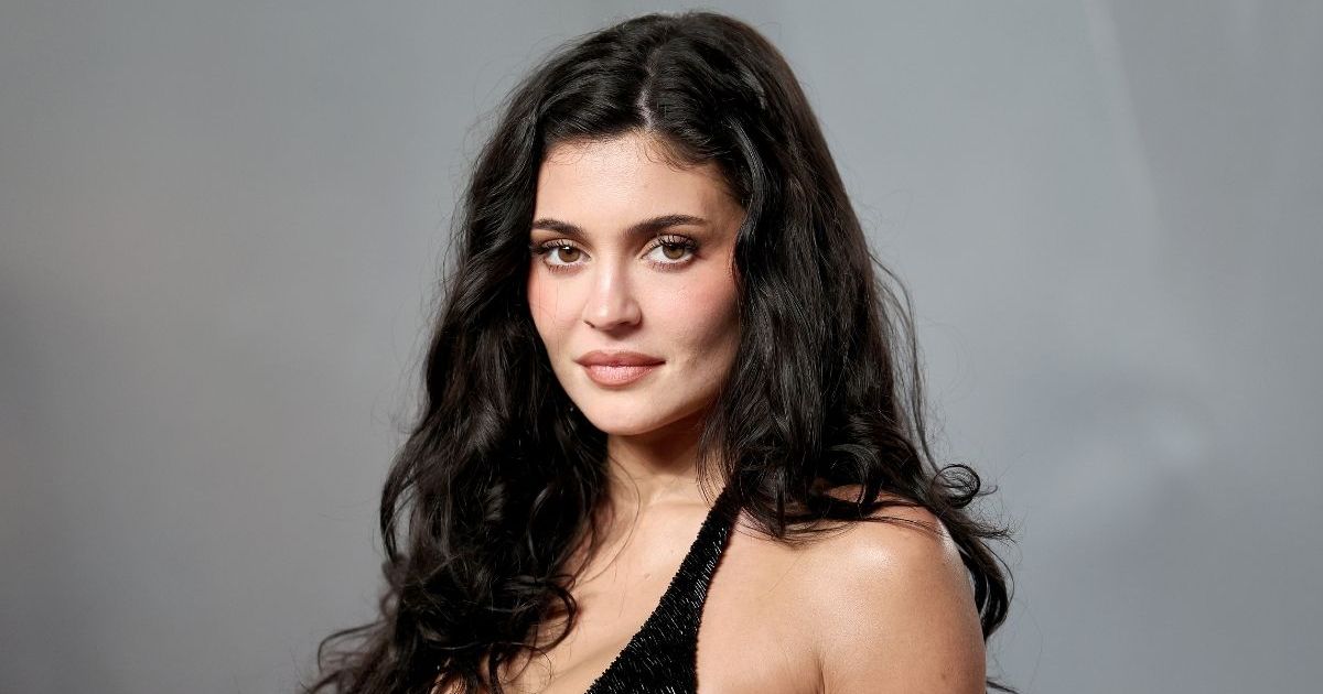 Kylie Jenner Poses in Bold Corset Micro Minidress for Kylie Cosmetics