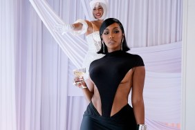 Porsha Williams in a black dress, surrounded by white drapes holding a a glass of champagne
