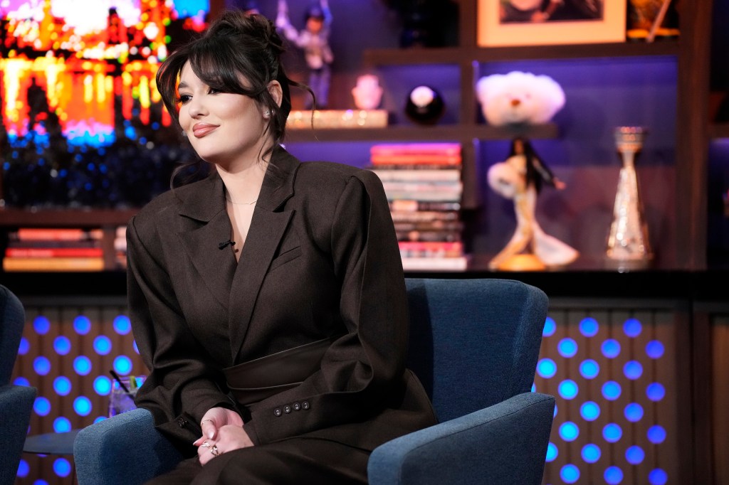 Jenna Woudberg in a brown blazer on Watch What Happens Live