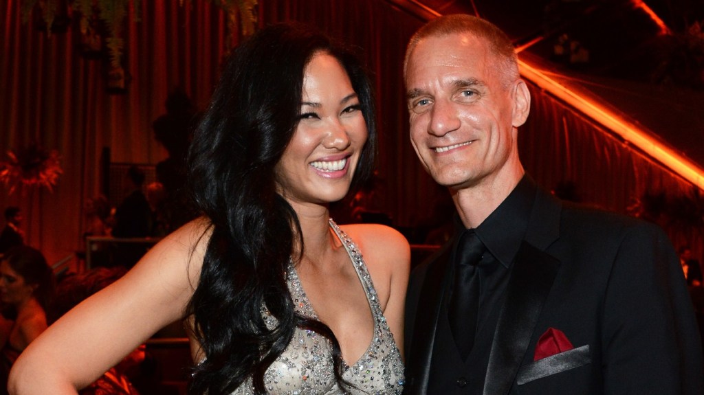 Kimora Lee Simmons and Tim Leissner posing together
