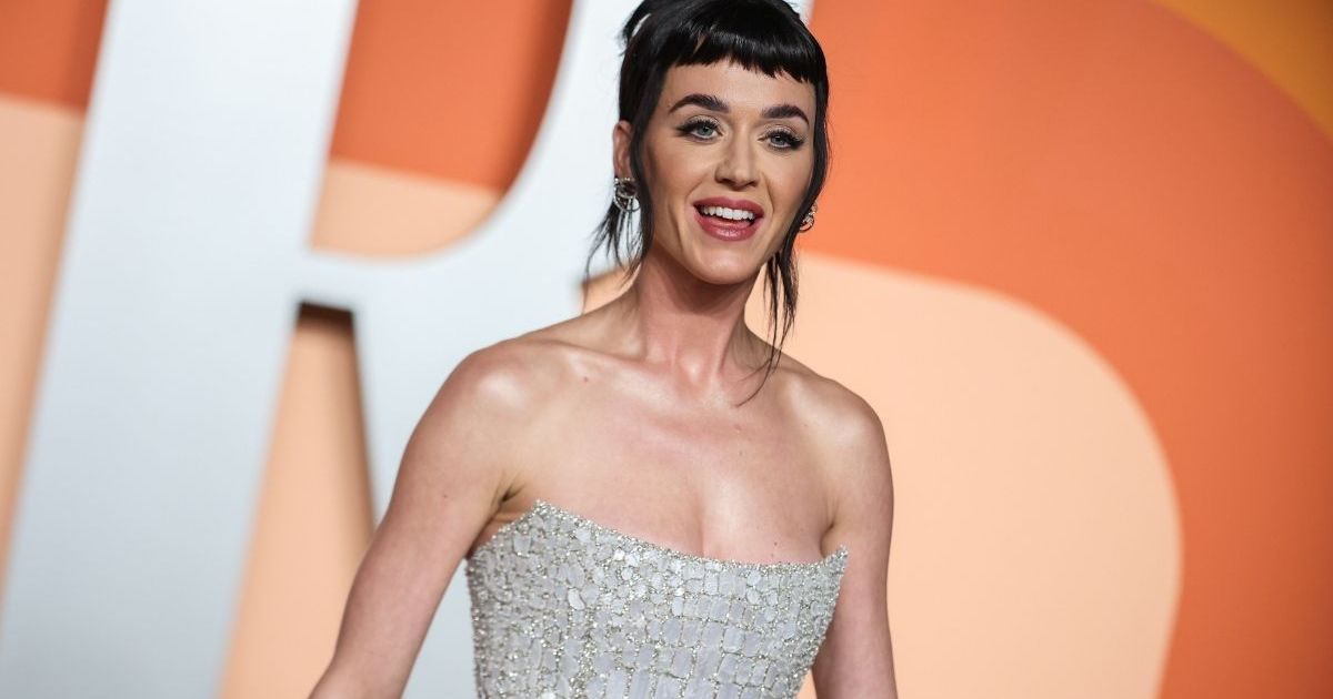 Katy Perry Coordinates With Boyfriend in Strapless Alaia Dress