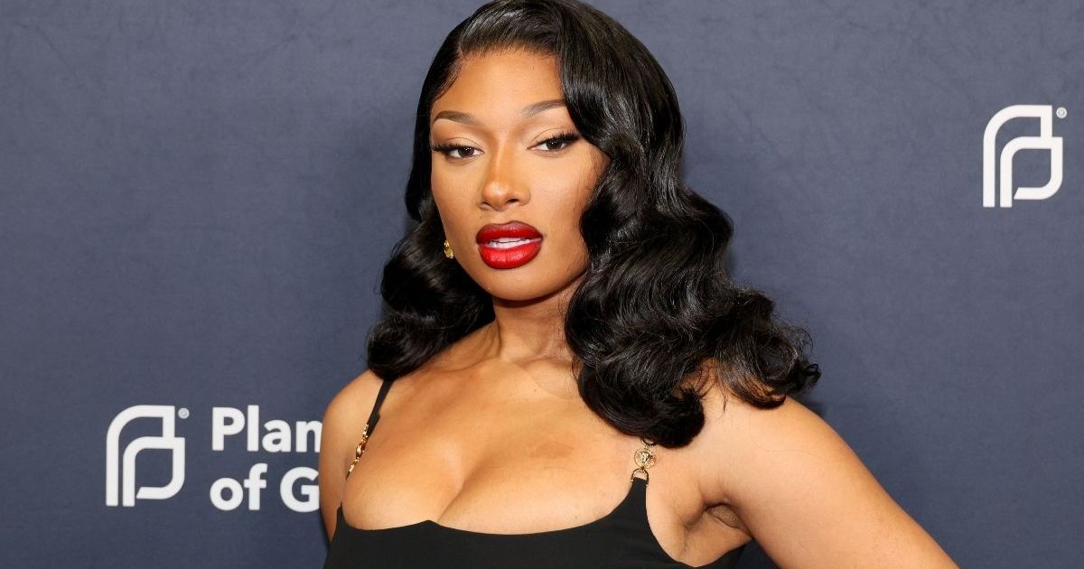 Megan Thee Stallion Meets Fans in Fully Sheer Top Amid Breakup Rumors