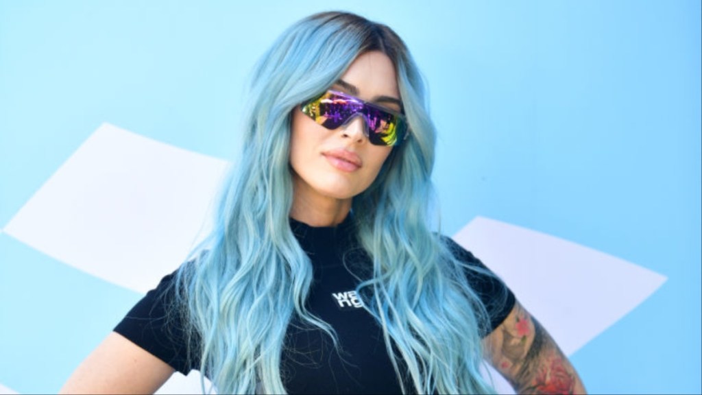 Megan Fox Dons Skirt Suit With Ridiculously Bold Neckline for Dr. Squatch