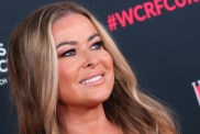 Carmen Electra’s Pantless Bikini Pose Shows off More Skin Than Expected