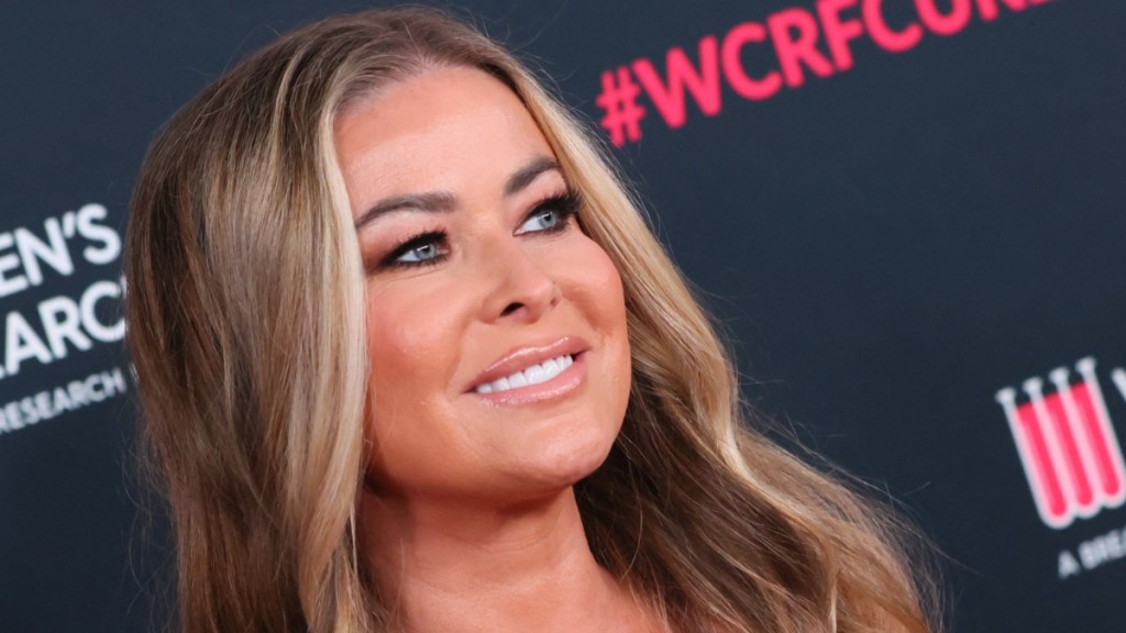 Carmen Electra’s Pantless Bikini Pose Shows off More Skin Than Expected