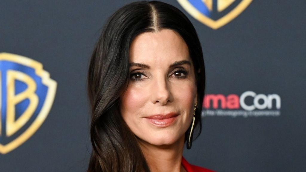 Sandra Bullock Mixes Risqué Bikini Top With Red Suit at Practical Magic 2 Event