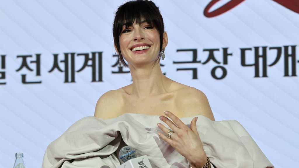 Anne Hathaway's Vaquera Top Dramatically Slips Off-The-Shoulder