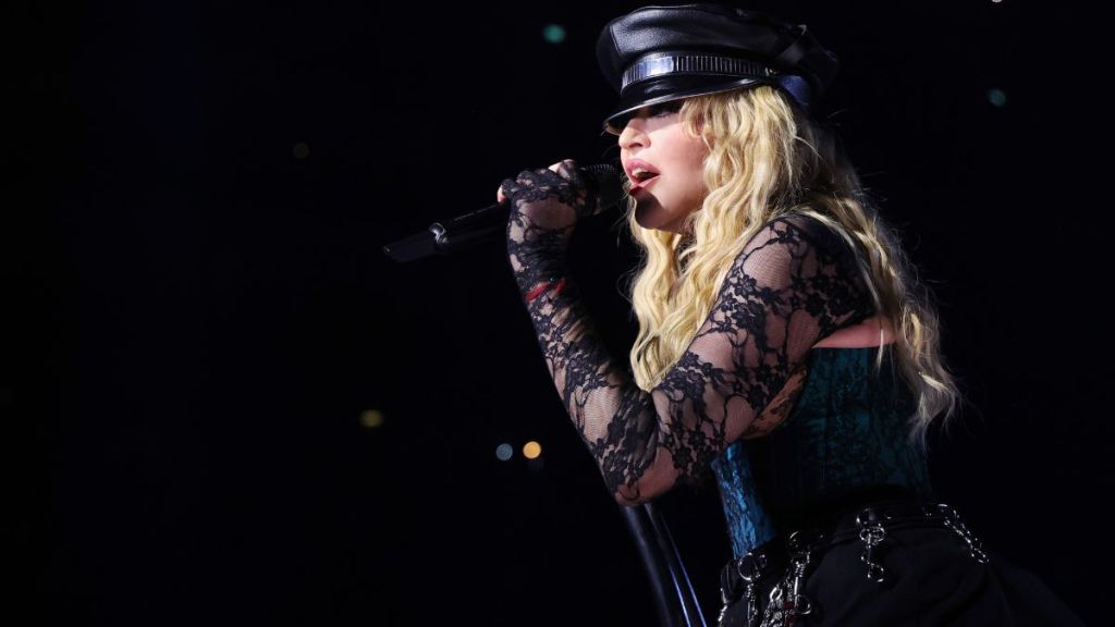 Madonna Shows How It's Done in Plunging Strapless Corset & Miniskirt