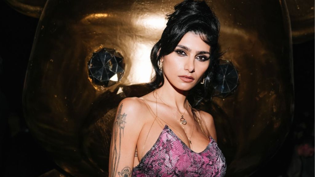 Mia Khalifa Sunbathes in Cut-Out Swimsuit That Leaves Little to the Imagination