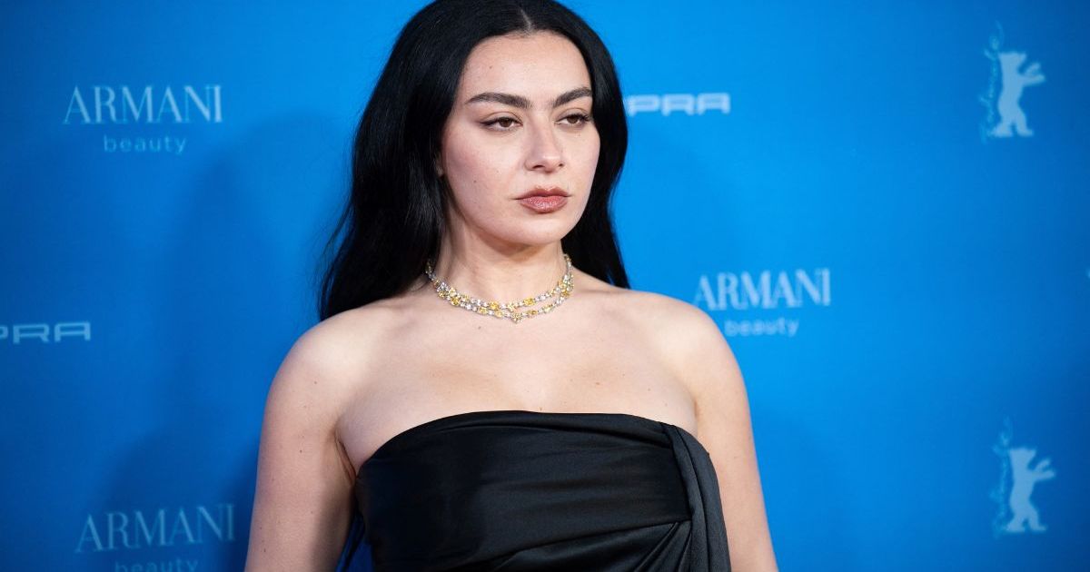 Charli XCX Exudes Bold Charm in Fishnet Dress for Vogue Cover