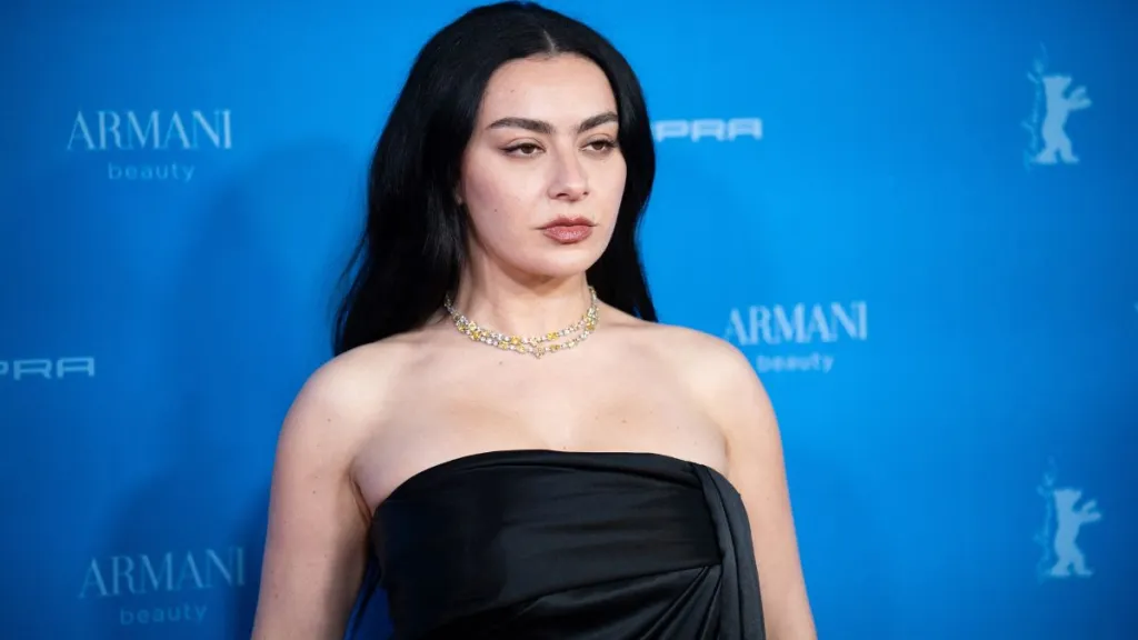 Charli XCX Exudes Bold Charm in Fishnet Dress for Vogue Cover