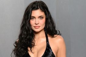 Kylie Jenner Elevates Stringy Dipped in Blue Bikini With Belly Chain