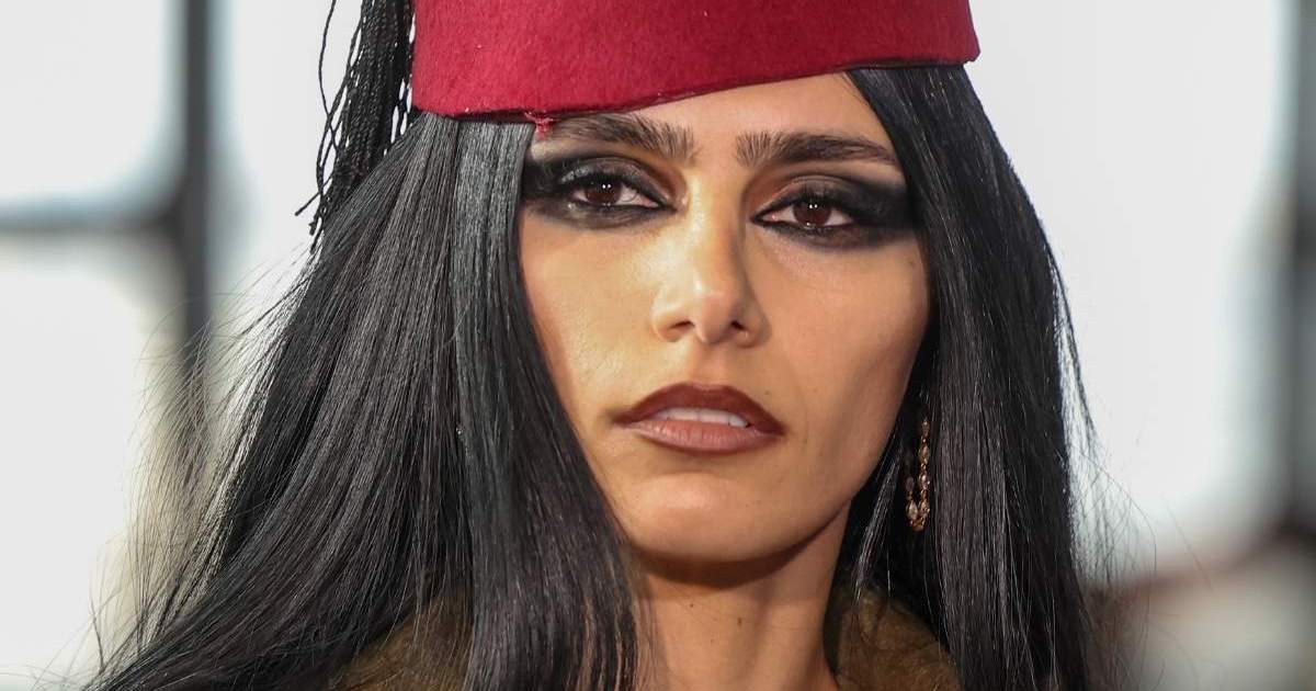 Mia Khalifa Draws Eyes to Her Tattoos in String Bikini for…