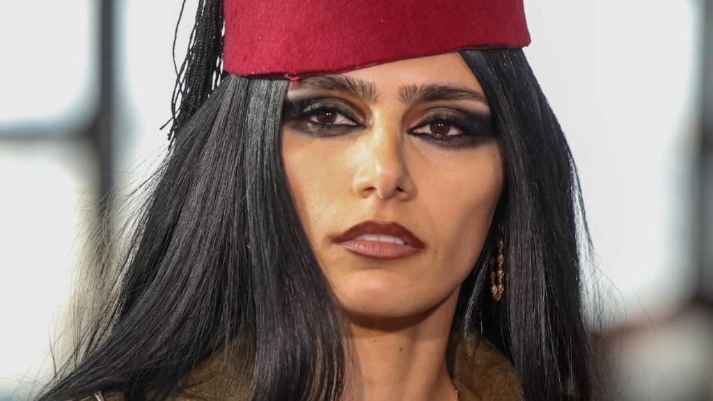 Mia Khalifa Draws Eyes to Her Tattoos in String Bikini for Sheytan