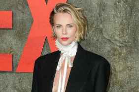 Charlize Theron Boldly Leaves Dior Suit Jacket Open With Neck Collar
