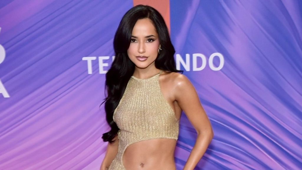 Becky G Puts on a Leggy Display in Waist-High Slit Dress