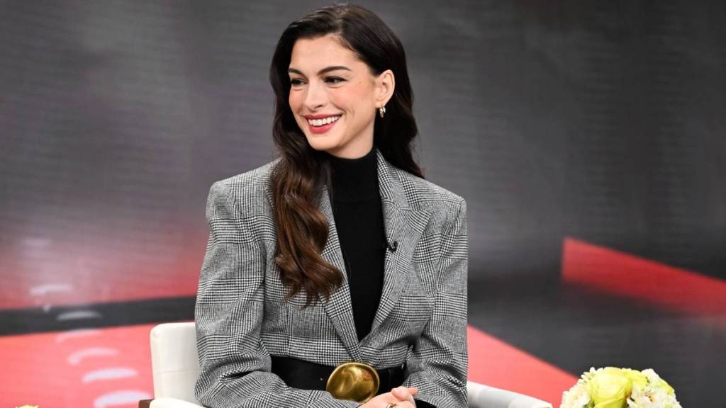 Anne Hathaway's Michael Kors Skirt Suit Gets a Dangerously High Slit