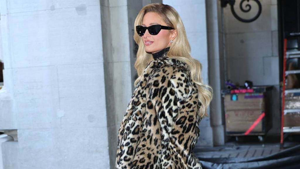 Paris Hilton Becomes 'Sliving Barbie' in Sheer Top & Micro Minidress