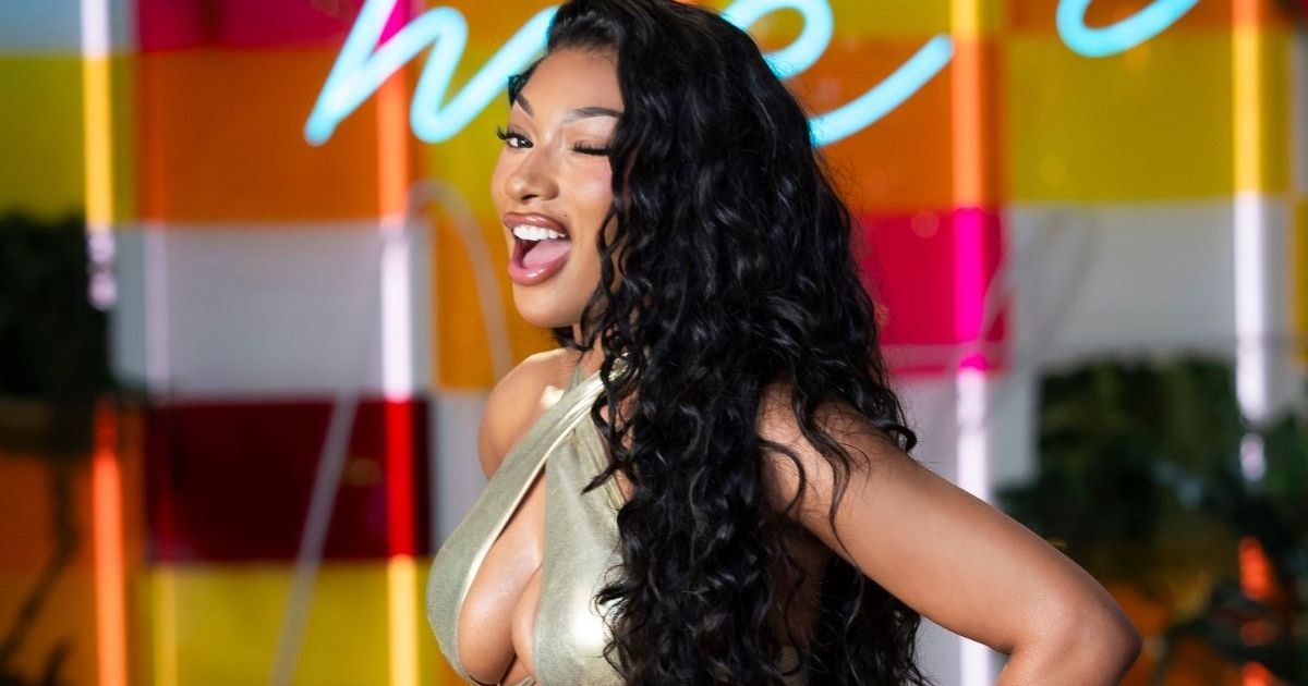 Megan Thee Stallion's Eye-Catching String Bikini Steals the Show at New Launch
