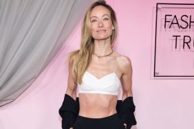 Olivia Wilde's Ashlyn Micro Crop Top Hangs by Strings Over High Slit Skirt