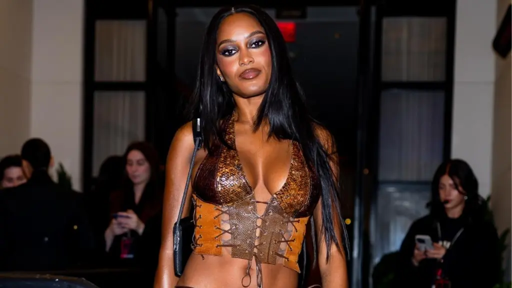 Ciara Miller Shows off More Than Just Curves in Lace-up Plunging Top