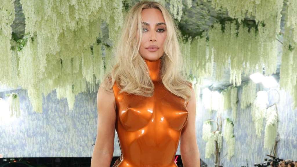 Kim Kardashian Drops Jaws in Barely-There Swimsuit During Beach Workout