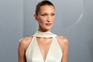 Bella Hadid’s Sun-Kissed Outing Comes With a Daring Neckline Mini Dress