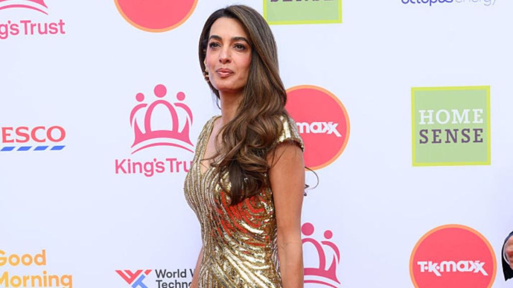 Amal Clooney Is a Golden Goddess in Archival Body-Hugging McQueen Gown