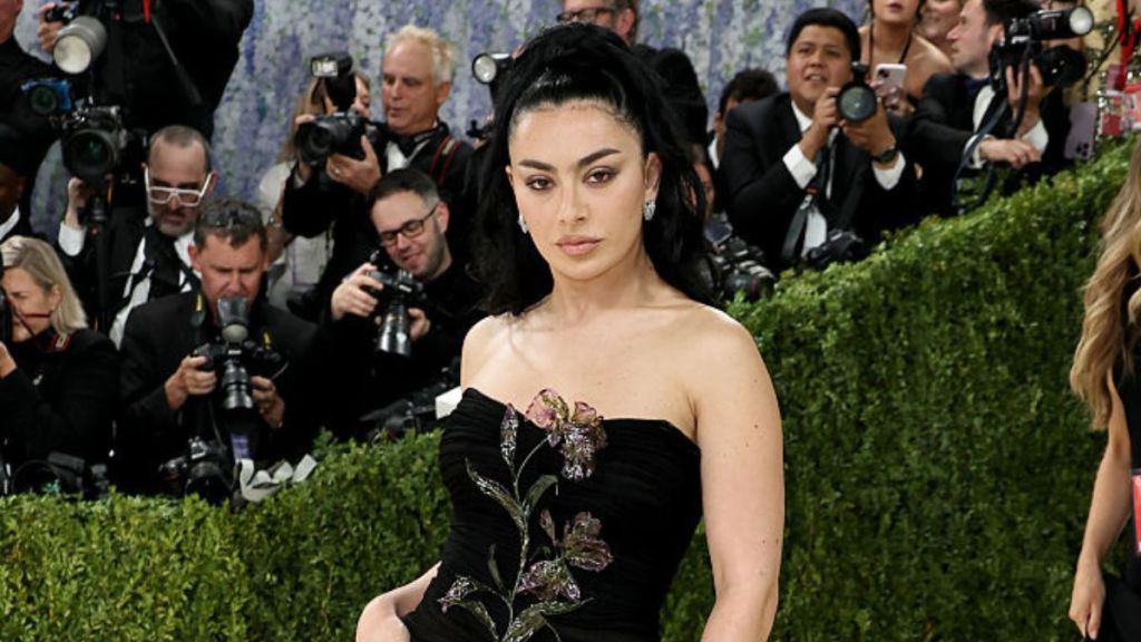 Charli XCX's Lacy Bra Gets Fully Exposed Under Unbuttoned Blazer