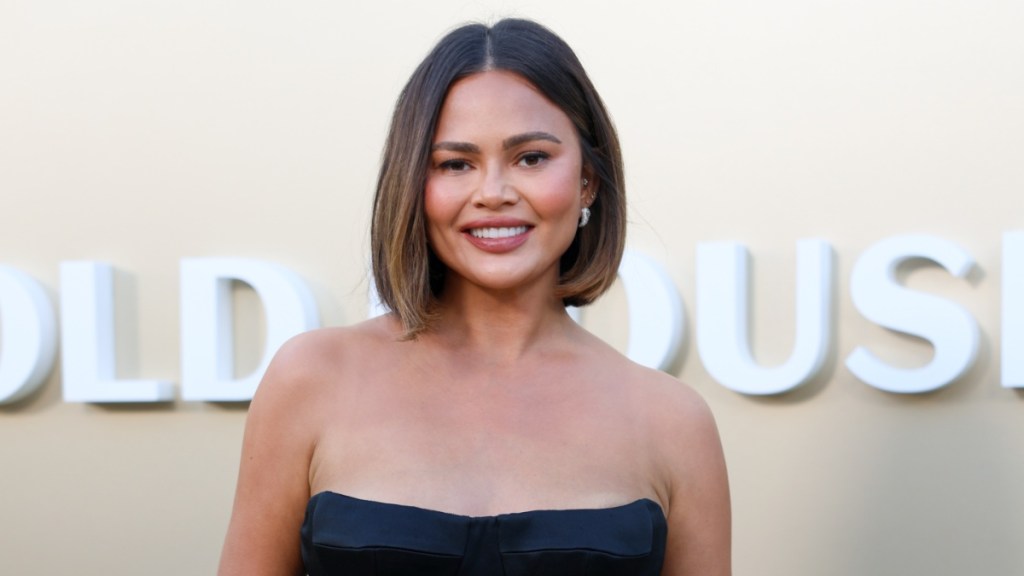 Chrissy Teigen Steals the Spotlight in Strapless Bubble Skirt Dress