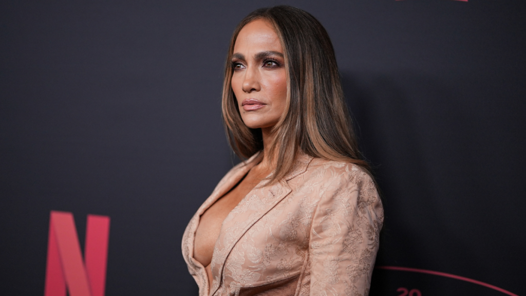 Jennifer Lopez’s Tiny Bra Boldly Peeks Through Brunello Cucinelli Blazer