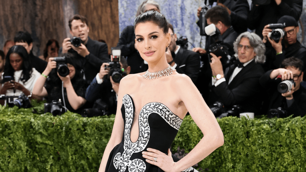 Anne Hathaway’s Armani Bodysuit Gets Soaking Wet & Bold Twist for Elle