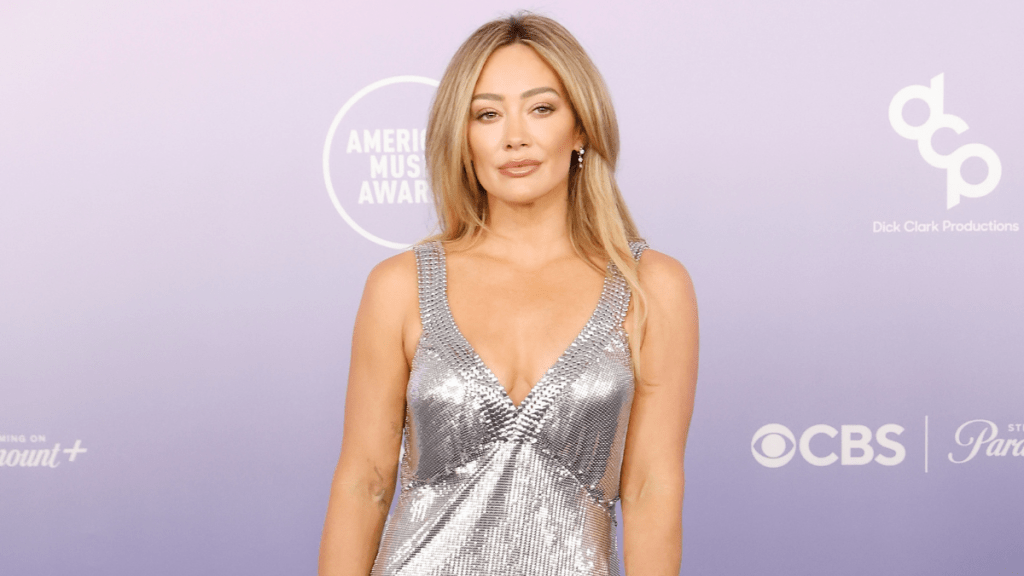 Hilary Duff’s Plunging Metallic Rabanne Dress Nearly Outshines the AMAs